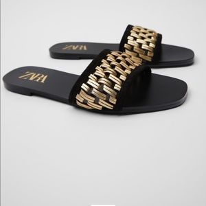 Slide sandals with golden woven strap